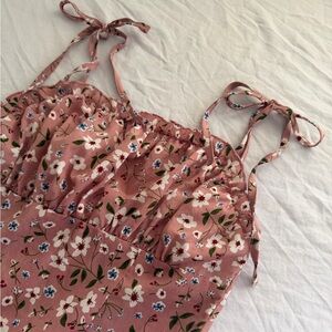 Pink floral mini dress with tie straps and ruched bust 🌸